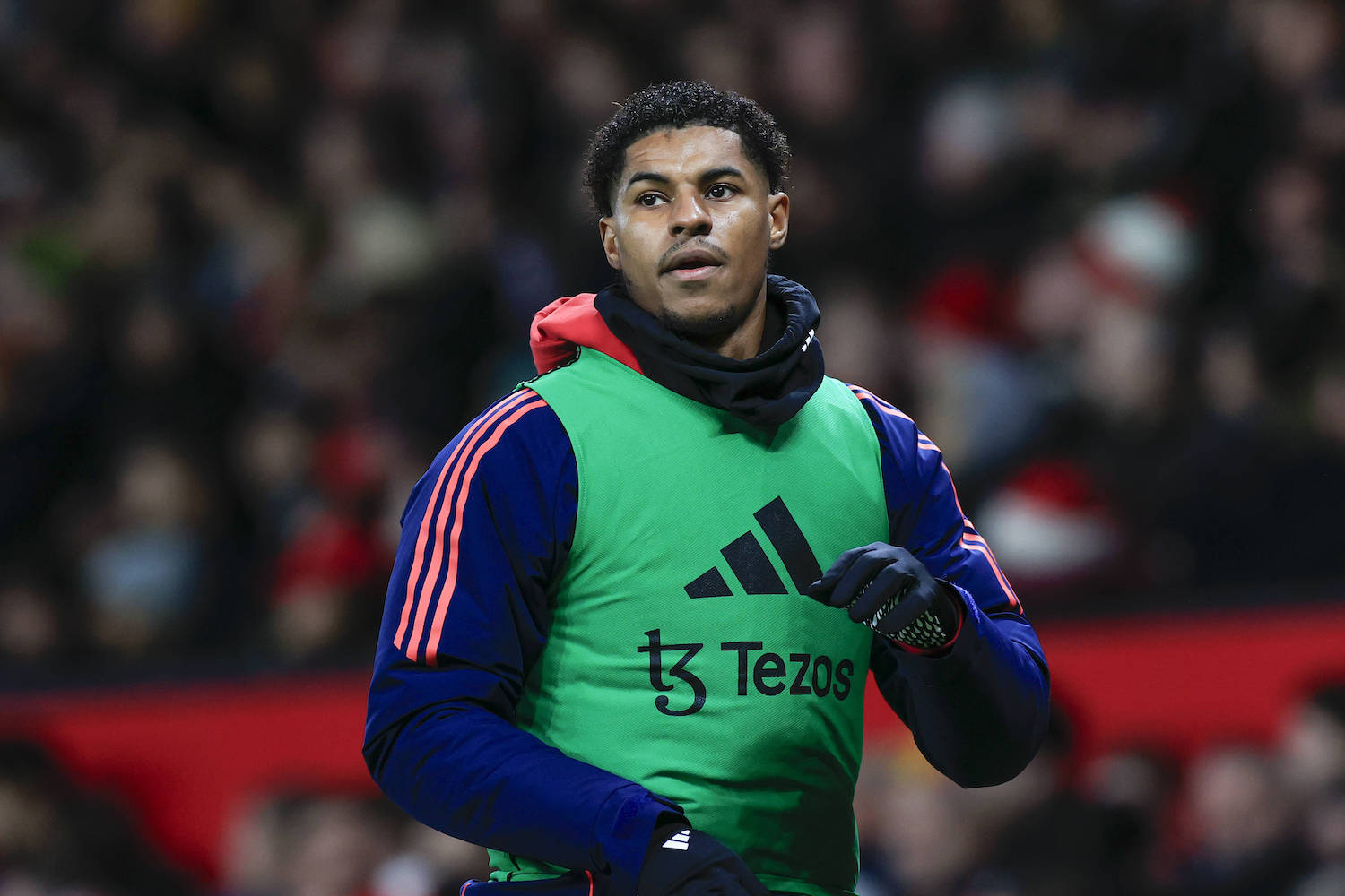 Manchester United, ManU v Newcastle United Premier League 30/12/2024. Marcus Rashford 10 of Manchester United warms up on the sidelines during the Premier League match between Manchester United and Newcastle United at Old Trafford, Manchester, England on 30 December 2024. Manchester Old Trafford Greater Manchester England Editorial use only DataCo restrictions apply See www.football-dataco.com , Copyright: xConorxMolloyx PSI-21159-0048