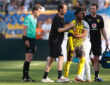 New Jersey, USA, 5th July 2025. Fran Garcia of Real Madrid embraces Julien Duranville of Borussia Dortmund as he leaves the field of play with medical staff after picking up an injury in a clash with the Spanish full back during the Real Madrid vs Borussia Dortmund FIFA Club World Cup match at Metlife Stadium, New Jersey. Picture credit should read: Jonathan Moscrop / Sportimage EDITORIAL USE ONLY. No use with unauthorised audio, video, data, fixture lists, club/league logos or live services. Online in-match use limited to 120 images, no video emulation. No use in betting, games or single club/league/player publications. SPI_101_JM_REALMADRID_BORUSSIA_ SPI-4005-0101