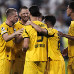 Juventus FC v Borussia Dortmund - UEFA Champions League Ramy Bensebaini of Borussia Dortmund celebrates with teammates after scoring a goal during the UEFA Champions League