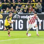 DORTMUND, GERMANY - OCTOBER 25: Said El Mala 1. FC Koeln, 13 controls the ball against Julian Ryerson Borussia Dortmund, 26 during the Bundesliga match between Borussia Dortmund vs. 1. FC Koeln at Signal Iduna Park on matchday 8 of the 1. Fussball Bundesliga on October 25, 2025 in Dortmund, Germany. DFL Advertising Board Richtig Guter - Really Good / Awesome One REGULATIONS PROHIBIT ANY USE OF PHOTOGRAPHS AS IMAGE SEQUENCES AND/OR QUASI-VIDEO. North Rhine-Westphalia Germany Copyright: xBEAUTIFULxSPORTS/Wunderlx
