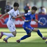 Italy v Uzbekistan : Round of 16- FIFA U-17 World Cup Qatar 2025 Samuele Inacio of Italy and Sayfiddin Sodikov of Uzbekistan in action during the FIFA U-17 World Cup Qatar 2025 Round of 16 match between Italy and Uzbekistan in Doha, Qatar, on November 18, 2025. DOHA Qatar Copyright: xNOUSHADxTHEKKAYILx