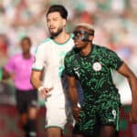 Marrakech, Morocco - January 10: Ramy Bensebaini of Algeria national team, Nationalteam and Victor Osimhen of Nigeria national team during the Africa Cup Of Nations Quarter-final match between Algeria and Nigeria at Marrakesh Stadium on January 10, 2026 in Marrakech, Morocco Algeria v Nigeria - Quarter-final - Africa Cup Of Nations 2025 Copyright: xSFSIx