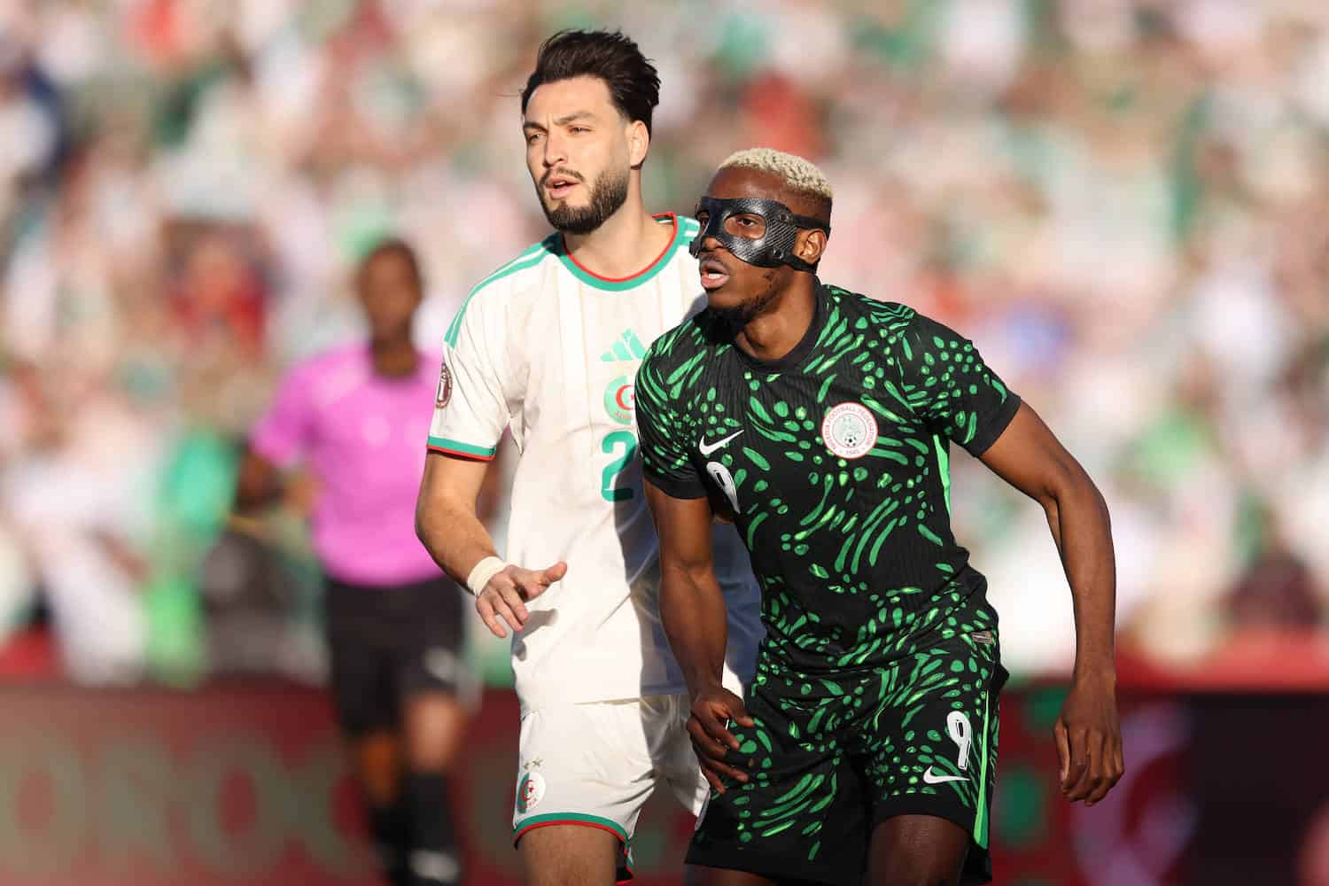Marrakech, Morocco - January 10: Ramy Bensebaini of Algeria national team, Nationalteam and Victor Osimhen of Nigeria national team during the Africa Cup Of Nations Quarter-final match between Algeria and Nigeria at Marrakesh Stadium on January 10, 2026 in Marrakech, Morocco Algeria v Nigeria - Quarter-final - Africa Cup Of Nations 2025 Copyright: xSFSIx